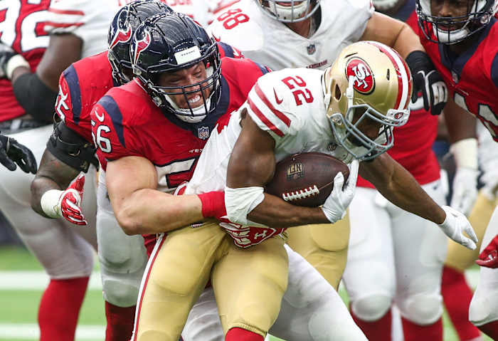 Texans inside linebacker Brian Cushing tackles 49ers running back Matt Breida during a 2017 game.